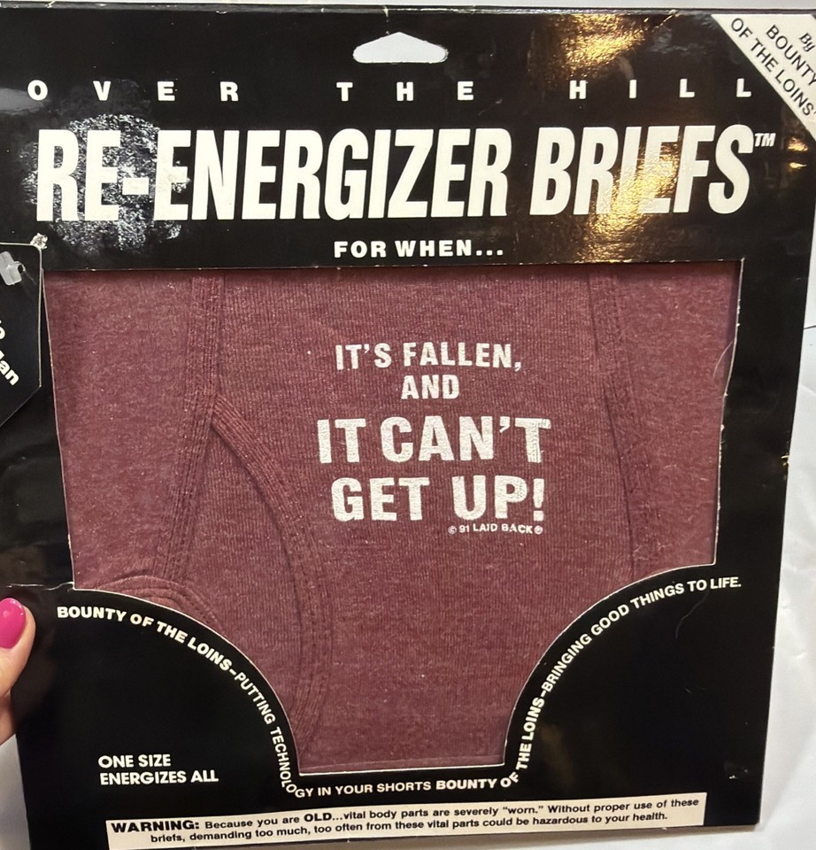 Deadpan vintage packaging turns a pair of briefs into a pitch-perfect over-the-hill gag — the 'It's Fallen & It Can't Get Up' tagline alone earns its keep.