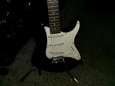 Yamaha Eterna Guitar black good condition new strings minor scratches 