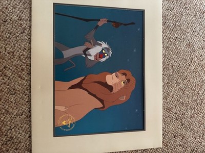 Disney Lithograph prints One of Mufasa and Rafiki and one of Mufasa and Simba.