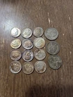 Lot Of 12 Silver Roosevelt Dimes with 3 1943 S nickles. Priced below melt value.