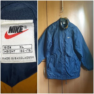 blue and yellow nike jacket