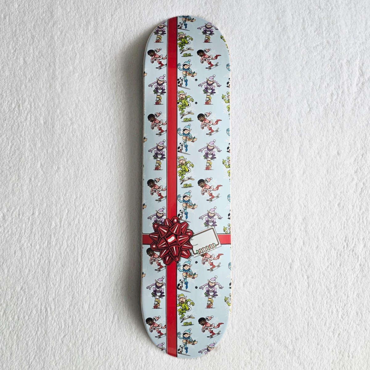 Strangelove Skateboards Elves Holiday Gift Wrap Deck Sean Cliver 8