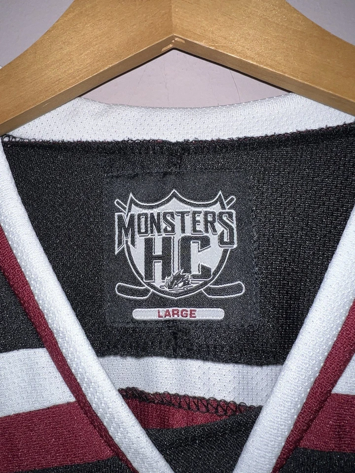 CAMISETA DE HOCKEY DE LIGAS MENORES DE LOS MONSTRUOS DEL LAGO ERIE COSIDA L CLEVELAND Foto 4 de 4