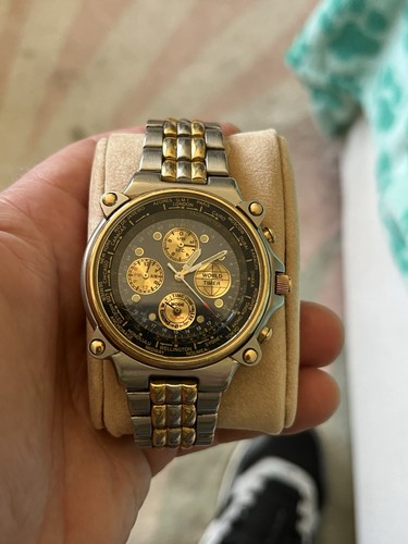Vintage pulsar by seiko world timer watch World Timer Chronograph. Blue And Gold