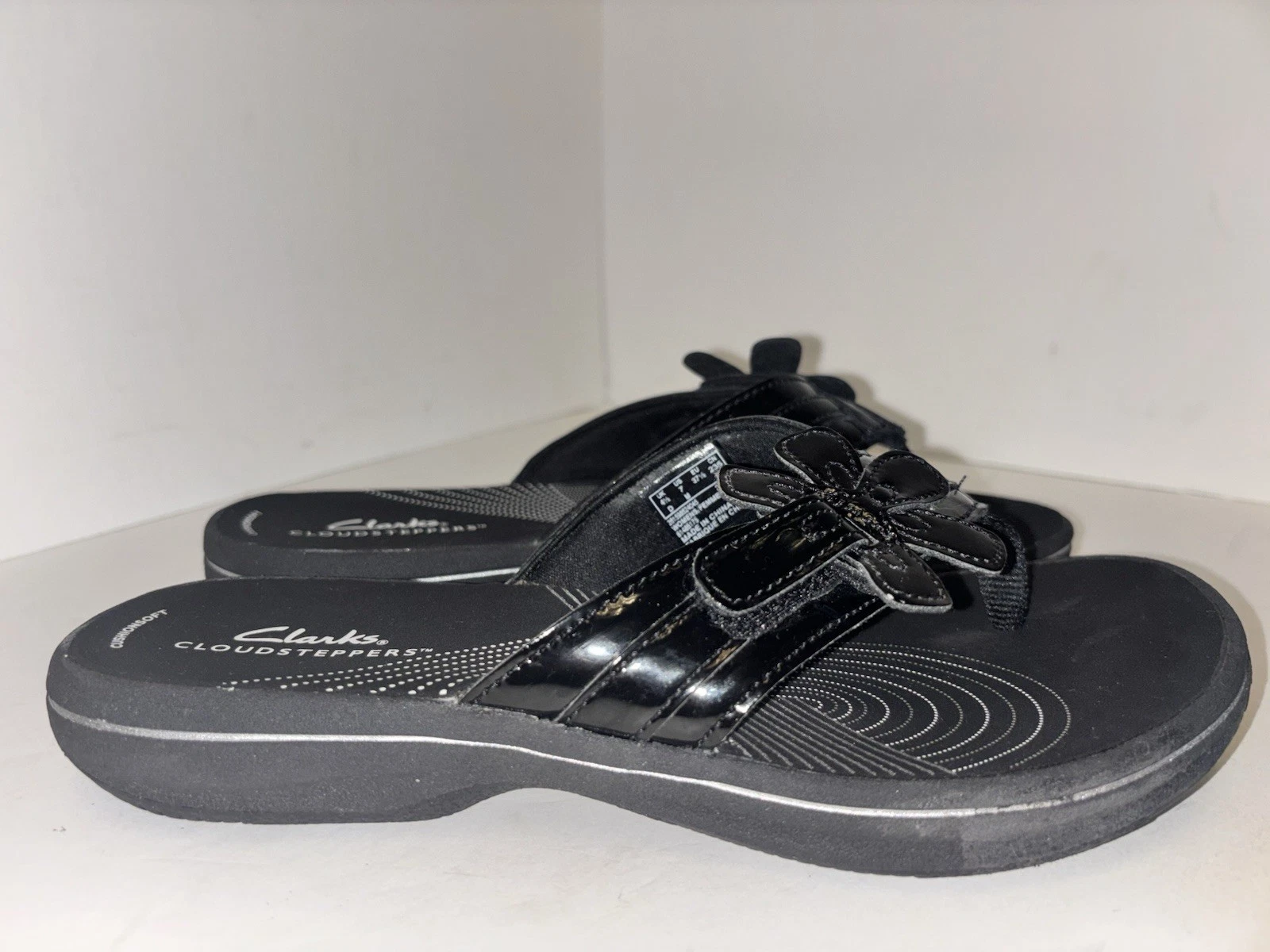 Perizoma donna Clarks Cloudsteppers nero vernice design floreale taglia 7