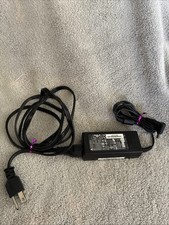 A Delta Electronics 65W AC Adapter Model ADP-65JH HB Power Supply Charger