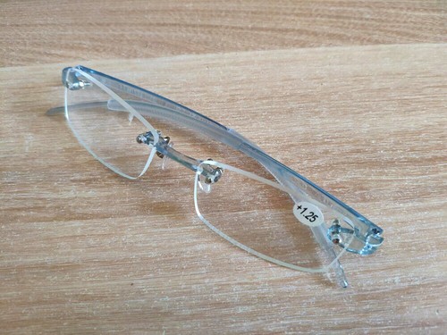Ultralight TR90 Elastic Blue Rimless Reading Glasses +50 +75 to +400 Magnifier
