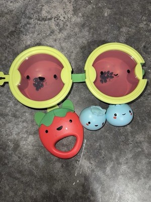 Skip Hop Musical Instruments: watermelon, strawberry, and blueberries
