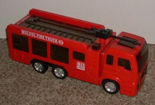WolVol Red Fire Truck Engine Electronic Rolls Lights Up Toy