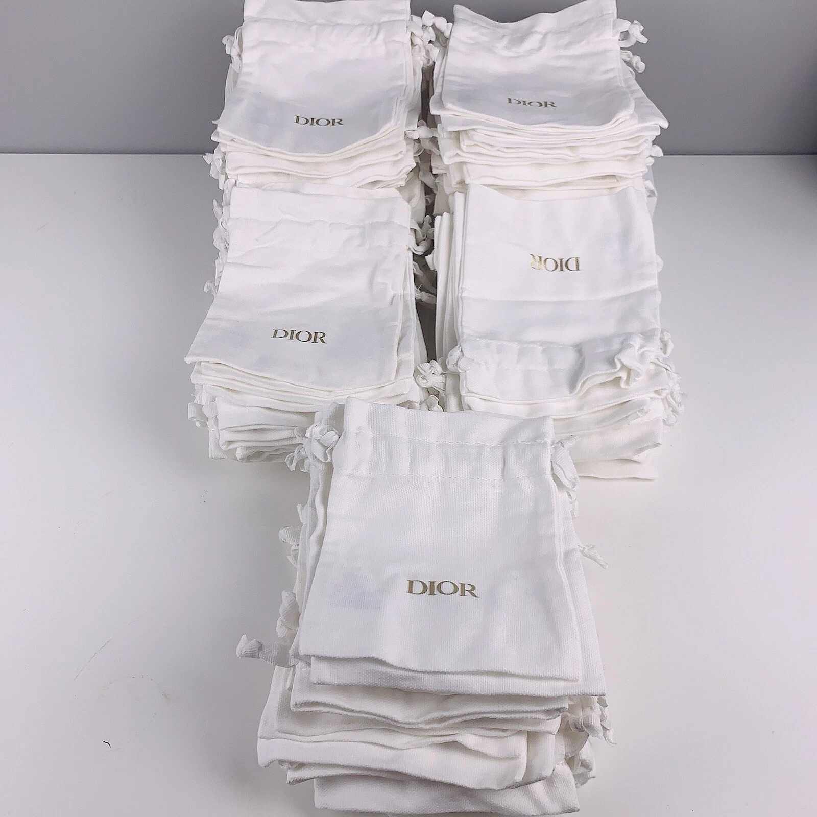 Vente en gros lot de 100 sacs à poussière en coton blanc cordon de serrage Christian Dior 6x5