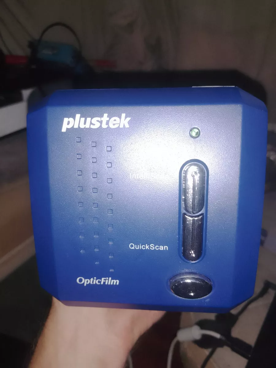 Plustek opticfilm 8100. Comes with {2 35mm slides, Ethernet & power wires, case