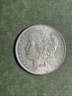 1886 Morgan Silver Dollar AU