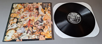 1988年 UK Carcass – Reek Of Putrefaction s-l400.jpg
