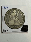 1869 SEATED LIBERTY DOLLAR VERY SCARCE DATE VG LOW MINTAGE