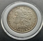 1881 S USA MORGAN SILVER DOLLAR BU toned