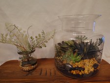 1 Large faux Glass Jar Succulent Terrarium  1 Smaller Glass Faux Fern Terrarium