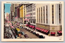 New York City NY~Looking Up Fifth Avenue~F.W. Woolworth~Flags~UNPTD NYC Postcard