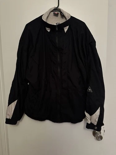 Vintage Men's Le Coq Sportif Black Jacket with Cream Accents - product listing photo