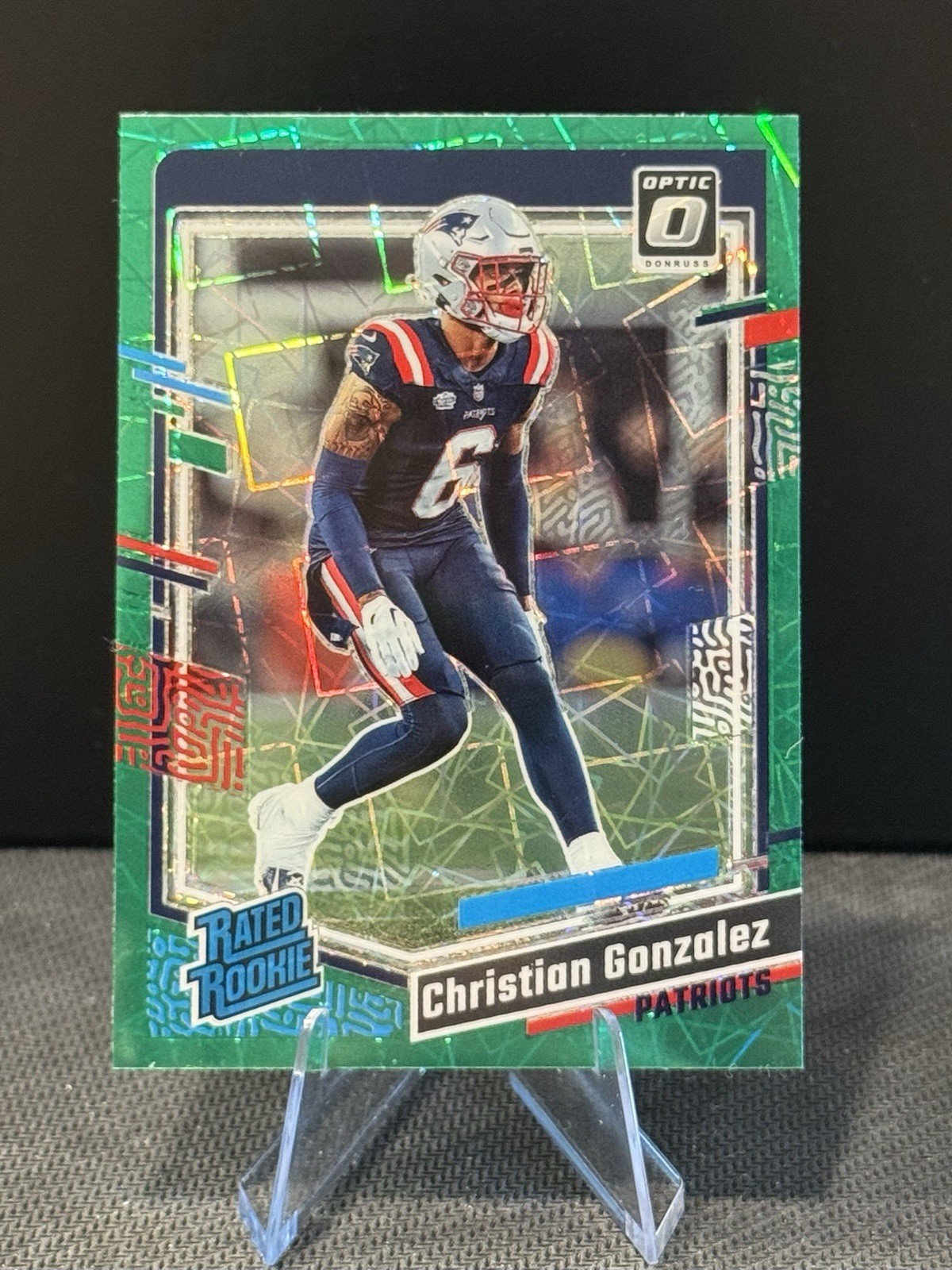 2023 Optic NFL - Rated Rookie Christian Gonzalez #274 Green Velocity Prizm (RC)