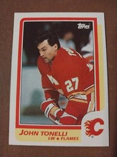 1986 JOHN TONELLI TOPPS NHL HOCKEY CARD #132 CALGARY FLAMES NY ISLANDERS NYI