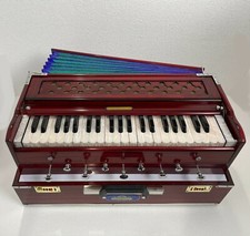 RED HARMONIUM ITEM LOCATED IN USA. SHIPS WITHIN 24 HOURS.  BRAND NEW 