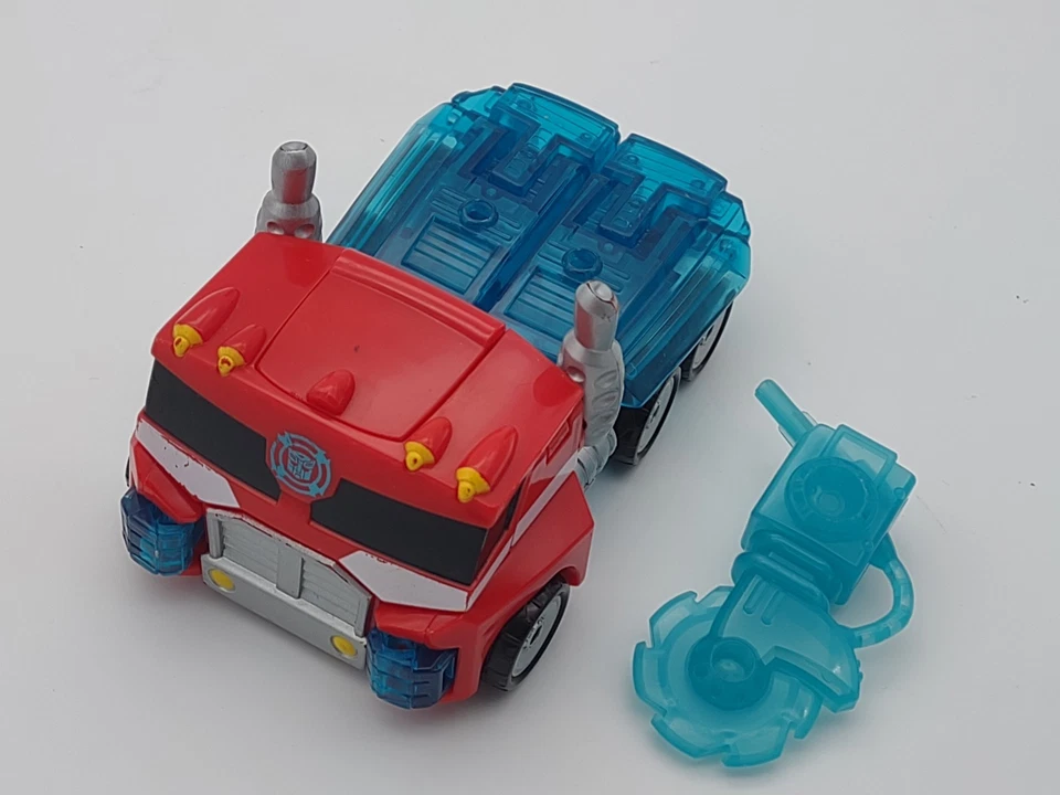 Transformers Rescue Bots Optimus Prime Energize Figure Semi Trailer Truck & Saw - Image 2 of 4