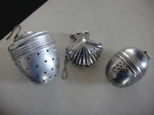 THREE VINTAGE TEABALL STRAINER INFUSERS- ACORN, BALL, & SHELL - HOOKS AND CHAINS