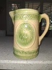 A E Hull Salt-Glazed Stoneware “Grazing Cows” Pitcher - Yellow Ware w/ Green