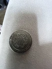 American Argent Mint World Trade Silver Round One Troy Ounce .999 Fine Silver