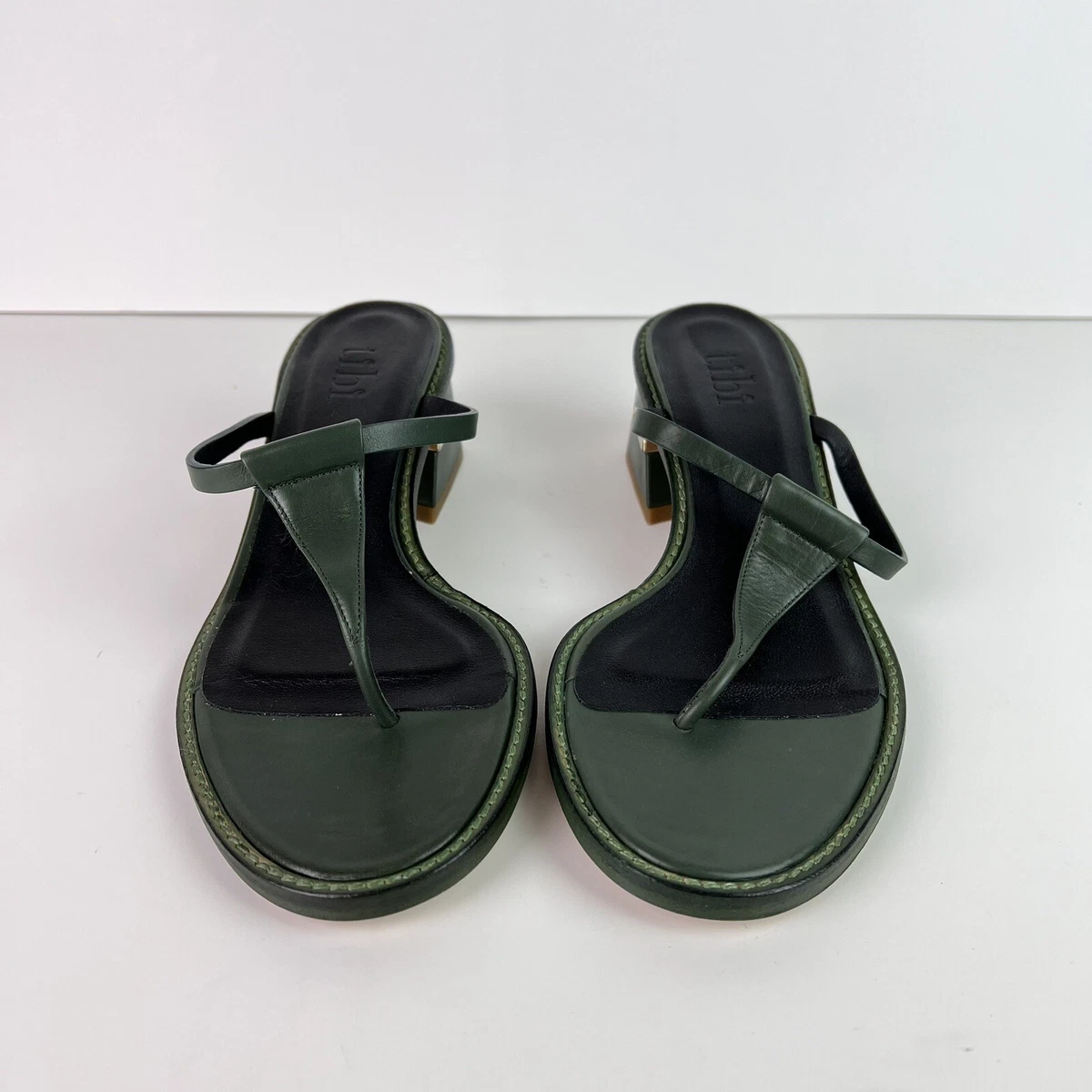 Tibi leather flip flops 2025