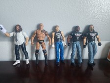 WWE lot of 5. The Rock, APA, mixed.