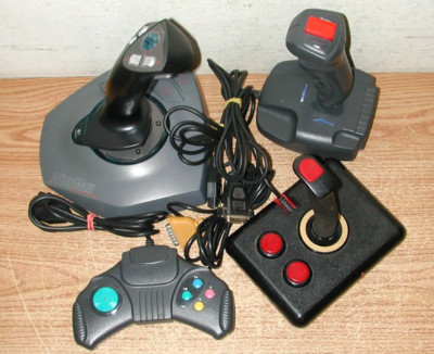LOT OF 4 VIDEO GAME 15 PIN JOYSTICKS AND CONTROLLERS: WINGMAN, GRAVIS & OTHERS