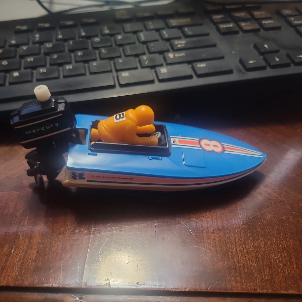 1978 TOMY SPEED BOAT OCEAN CUP RACE CHAMPIONS 8 MERCURY WINDUP TOY - Imagem 4 de 4