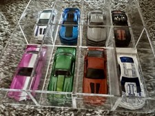Hot Wheels Set of 8 Chevy Camaro’s in Clear Case
