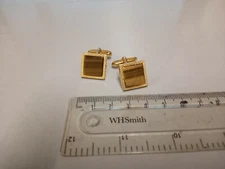 Tigers eye set gold plated swivel action cuff links.