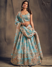 Latest Presenting Organza Lehenga Choli With Sky Blue Dupatta For Function Wear