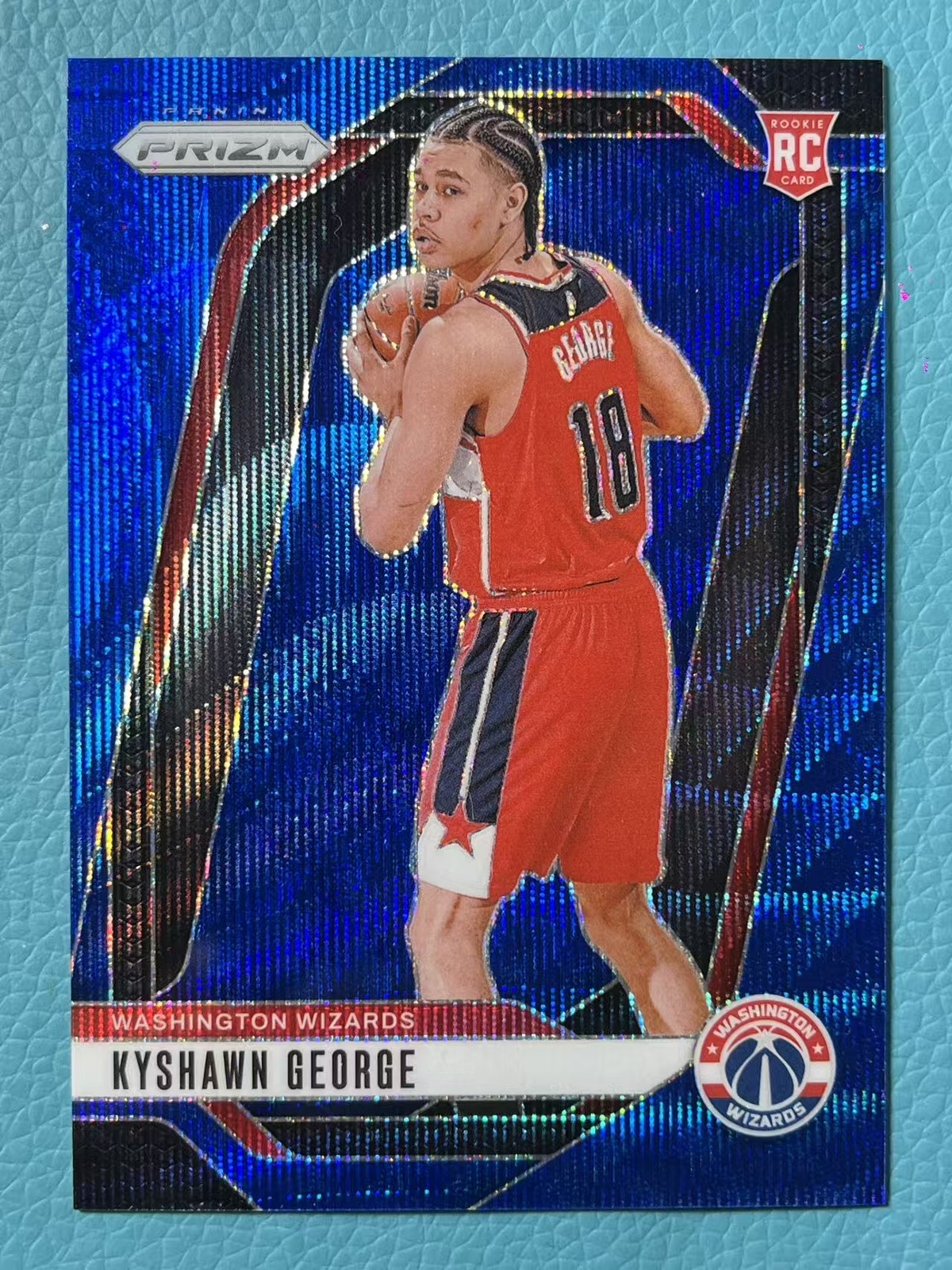 Kyshawn George 2024-25 Panini Prizm 079/125 Blue Wave RC #257