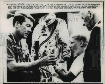 #ad 1962 Press Photo Walter M. Schirra explains pressure suit to his son Walter III $24.99