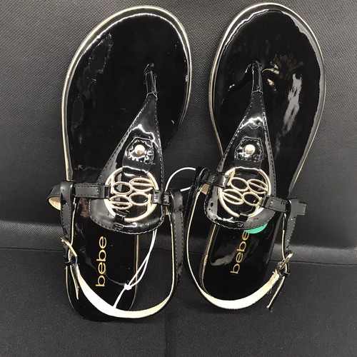 Bebe Janney Damen-Sandale 7,5 W – schwarz goldfarbenes Logo-Obermaterial Fersenriemen flache Sandalen. - Bild 8 von 8