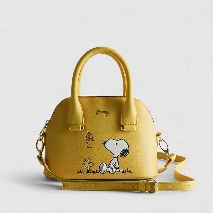 Sac à main bandoulière Snoopy Peanuts Mini jaune Primark neuf avec étiquette - Photo 1/4