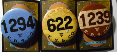 AD0291: Three E.B.S. Co. 2.25'' Employee ID cello pinback buttons