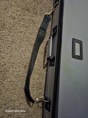 grey padded with pockets and straps to carry comfortely your roll up banners