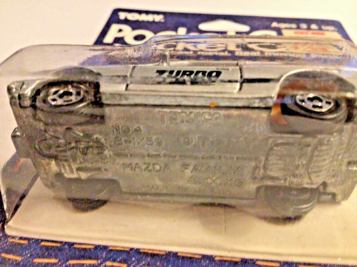 TOMICA Tomy 4 MAZDA (323) FAMILIA 1500XG TURBO silver, sealed