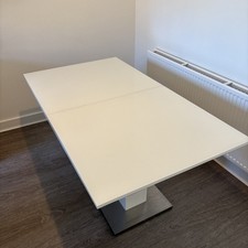 extending glass dining table