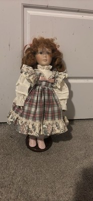 Porcelain Doll Red Hair Has A Stand Pink Shoes And Cute Plaid Flower Dress
