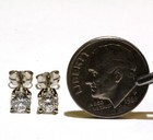 GIA certified 14k white gold .68ct round diamond 4 prong solitaire stud earrings — photo 3