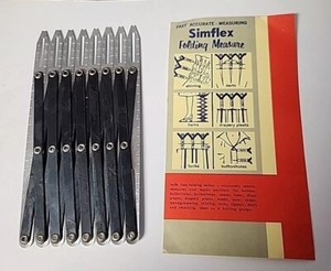 VINTAGE USED SIMFLEX FOLDING MEASURE FOR BUTTON SPACING PLEATS HEMS TUCKS
