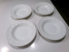 PIER 1 BAKSET RELIEF LOT OF 4 RIMMED SOUP BOWLS