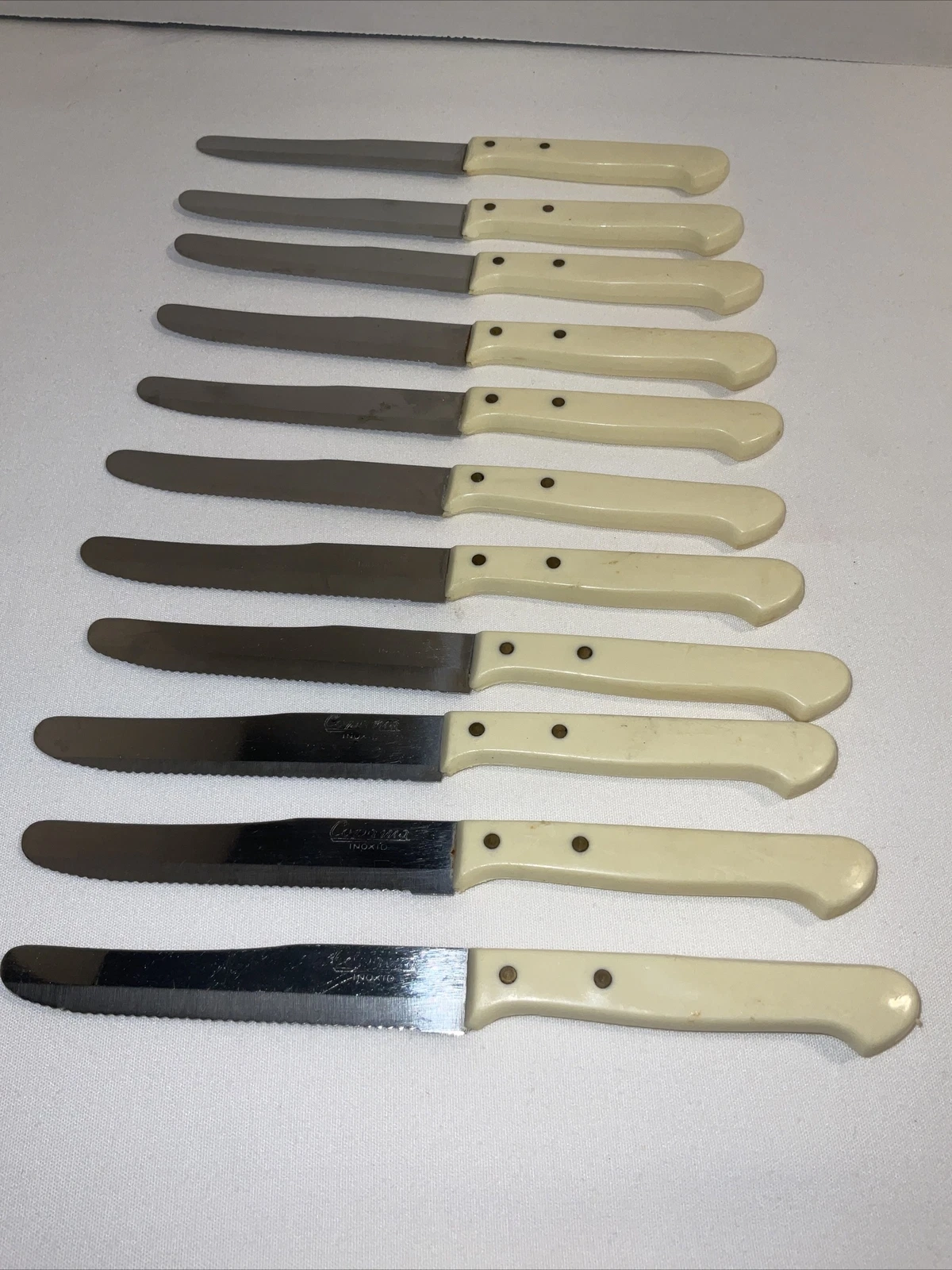 Vintage white handle serrated knives Inox CUPAMA set of 11