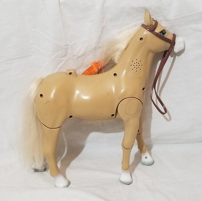 toy horse that walks and neighs